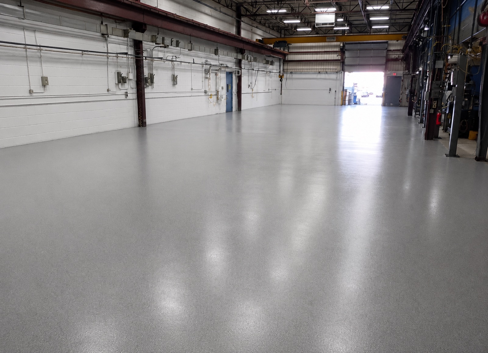 Commercial epoxy flooring installed in a Grand Forks warehouse